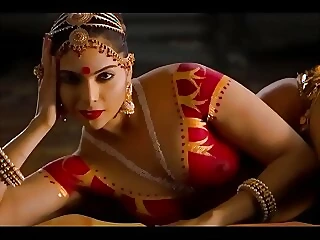 Una bailarina india despiadada realiza una rutina apasionada y sin filtros en un campo desolado.