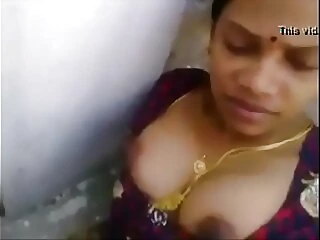 Sultry Tamil aunty indulges in a wild session, showcasing her expertise in pleasuring a man and satisfying her own desires.