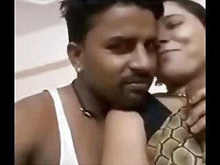 Desi aunt shows off her big boobs in a tit-facing position.